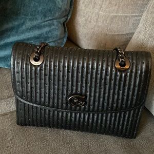 Coach Parker with Rivets